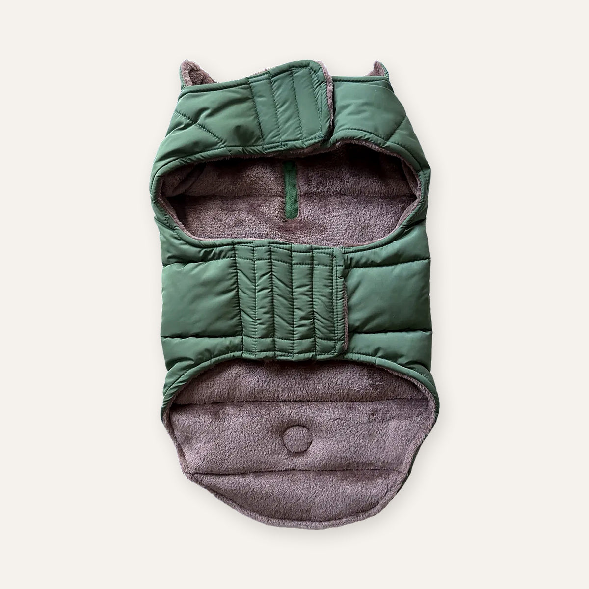Woodland Green dog puffer coat with taupe fleece lining and hook-and-loop chest strap